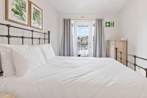 Ένα ή περισσότερα κρεβάτια σε δωμάτιο στο Mountain View Townhouse Fresh and Bright at Blue +40 φωτογραφίες