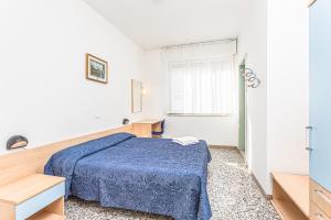 Krevet ili kreveti u jedinici u okviru objekta Hotel Eritrea