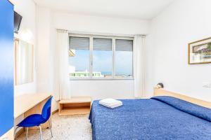 Krevet ili kreveti u jedinici u okviru objekta Hotel Eritrea