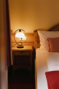Postel nebo postele na pokoji v ubytování Berghotel Wiedener Eck