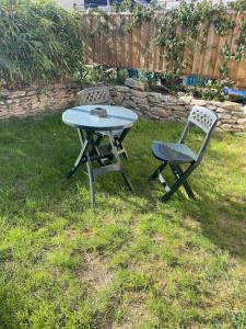 Vonkajšia záhrada v ubytovaní Appartement avec Jardin