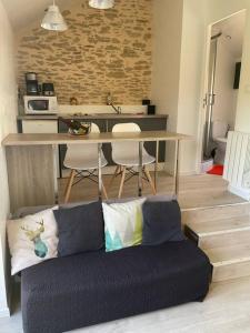 Kuchyňa alebo kuchynka v ubytovaní Appartement avec Jardin