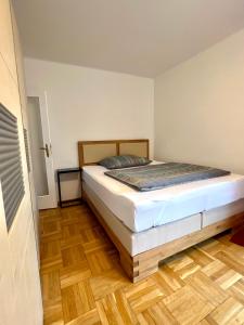 Posteľ alebo postele v izbe v ubytovaní Apartment Mia