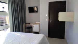 Postel nebo postele na pokoji v ubytování HOTEL VIZON II