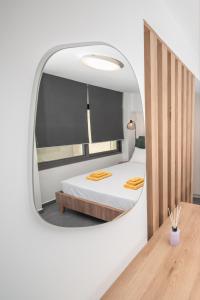 Ένα ή περισσότερα κρεβάτια σε δωμάτιο στο Zen Central Luxury Apartment