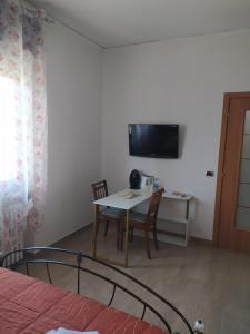 A television and/or entertainment centre at Villa Rita