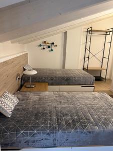 A bed or beds in a room at Casa della Regina