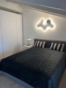 A bed or beds in a room at Casa della Regina