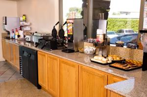 A kitchen or kitchenette at Cedars Inn