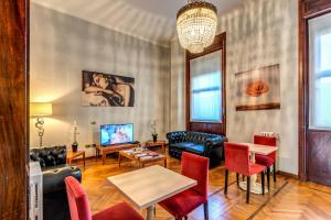TV a/nebo společenská místnost v ubytování Hotel Apollo