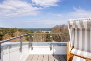 a balcony with a view of the water at Strandresidenzen Binz-Prora Strandresidenzen Binz-Prora V5 1 in Binz