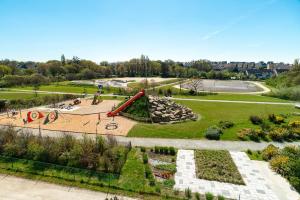 Vonkajšia záhrada v ubytovaní Les Thermes 532 - Vue mer avec piscine partagée