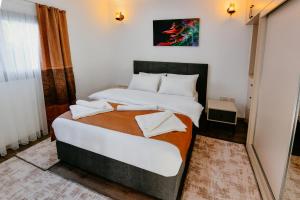 Кровать или кровати в номере Luxuriant Houses Kyrenia