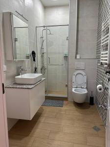 Ванна кімната в HOTEL AMSTERDAM