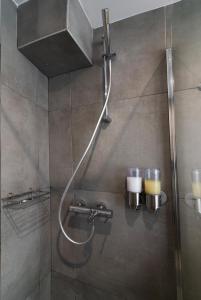 Koupelna v ubytování Olvia Suites
