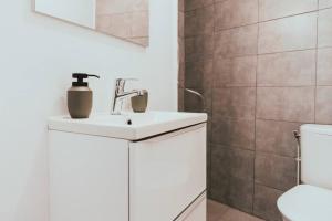 Koupelna v ubytování JUPITER - Un logement neuf et de qualité