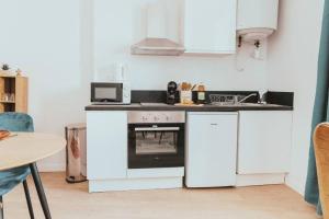 Kuchyň nebo kuchyňský kout v ubytování JUPITER - Un logement neuf et de qualité