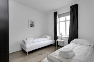 Postel nebo postele na pokoji v ubytování Cozy 2 Bedroom Apartment in Central Reykavik
