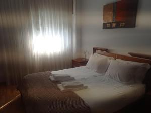 Postel nebo postele na pokoji v ubytování Apartamentos Vila Verde