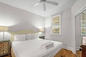 Ένα ή περισσότερα κρεβάτια σε δωμάτιο στο Caribe B-1111