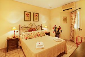 A bed or beds in a room at Vcv Bungalow Belda