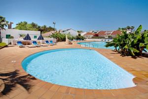 The swimming pool at or close to Vcv Bungalow Belda