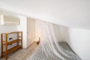 A bed or beds in a room at Vcv Bungalow Belda