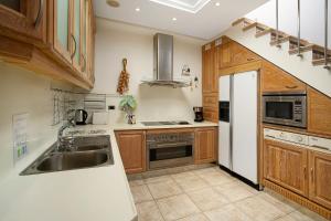 A kitchen or kitchenette at Vcv Bungalow Belda
