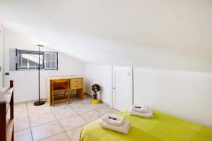 A bed or beds in a room at Vcv Bungalow Belda