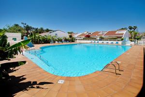 The swimming pool at or close to Vcv Bungalow Belda