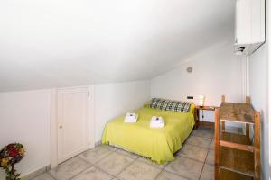 A bed or beds in a room at Vcv Bungalow Belda