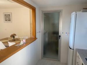Kuchyň nebo kuchyňský kout v ubytování Apartamento Alcotan