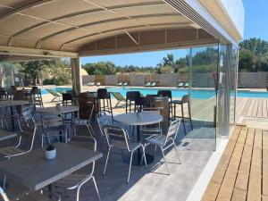 Bazén v ubytování Apt 91, T2 à LECCI avec piscines, proche plage nebo v jeho okolí