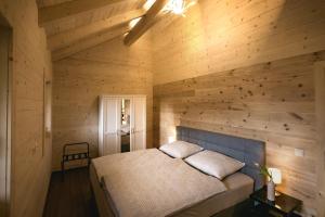 Postel nebo postele na pokoji v ubytování Chalet 49 Nesselgraben - Ferienwohnungen aus Holz