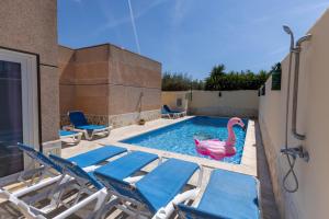 Bazén v ubytovaní Villa Roberto Ibiza alebo v jeho blízkosti