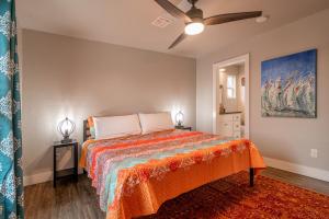 a bedroom with a bed and a ceiling fan at Plaza Pad II-Near Plaza District in Oklahoma City