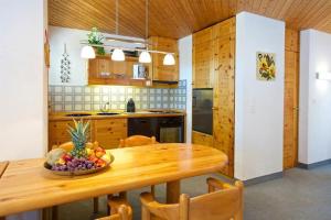 Kuchyň nebo kuchyňský kout v ubytování Apartment Schweizerhof 242 Lenzerheide