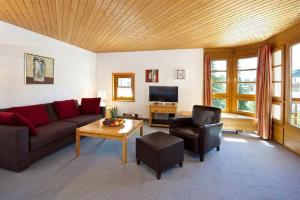 TV a/nebo společenská místnost v ubytování Apartment Schweizerhof 242 Lenzerheide