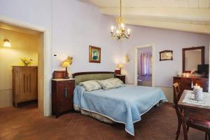 Postel nebo postele na pokoji v ubytování Villa Melangola + 34 fotografií