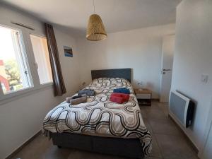 Posteľ alebo postele v izbe v ubytovaní Apt 91, T2 à LECCI avec piscines, proche plage + 27 fotografií