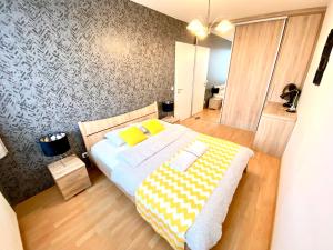 Кровать или кровати в номере Keleti Aparthotel