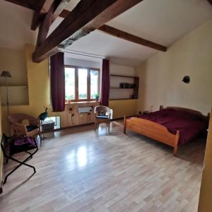 Postel nebo postele na pokoji v ubytování Auberge du Précontent