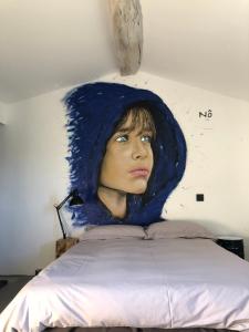 Posteľ alebo postele v izbe v ubytovaní L’atelier