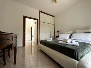 Posteľ alebo postele v izbe v ubytovaní Maison dei Trulli