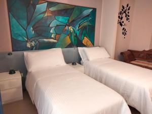 Posteľ alebo postele v izbe v ubytovaní B&b Bagheria