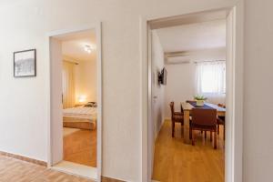 Postel nebo postele na pokoji v ubytování Apartman Stela