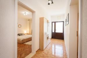 Postel nebo postele na pokoji v ubytování Apartman Stela