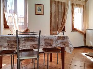 Posedenie v ubytovaní Ospitaci Appartamenti San Salvatore