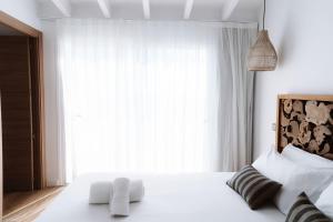 Posteľ alebo postele v izbe v ubytovaní Outsite Ibiza