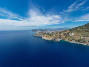 an aerial view of a large body of water at Koruwoodenhouse in Gazipasa